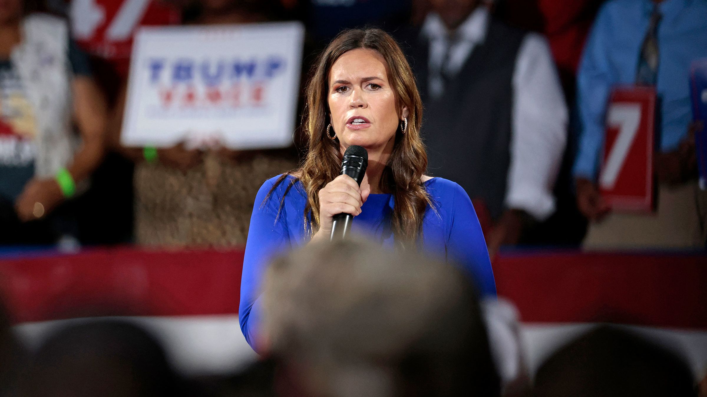 Arkansas Gov. Sarah Huckabee Sanders moderates a town hall meeting with former President Donald Trump at the Dort Financial Center in Flint, Michigan, on September 17.