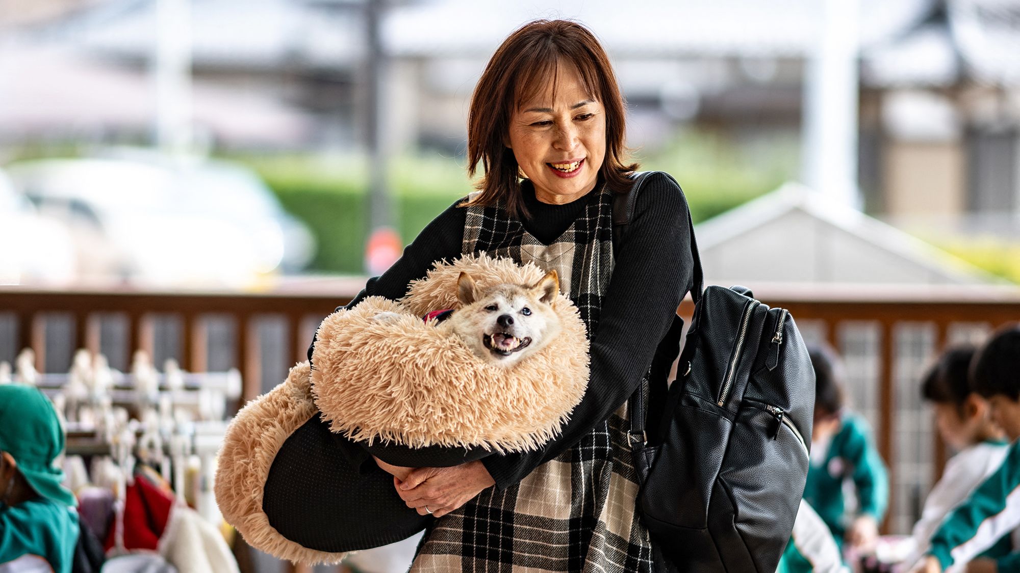 The late Kabosu pictured with her owner Atsuko Sato in Chiba prefecture, east of Tokyo, in March 2024.