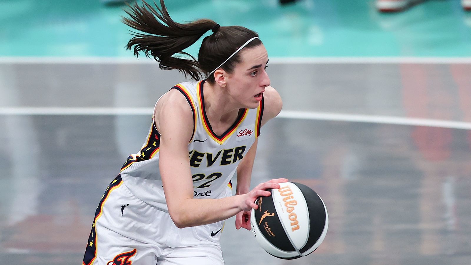 BROOKLYN, NY - JUNE 02:  Caitlin Clark #22 of the Indiana Fever controls the ball during the game against the New York Liberty on June 2, 2024 at the Barclays Center in Brooklyn, New York.  (Photo by Rich Graessle/Icon Sportswire via Getty Images)