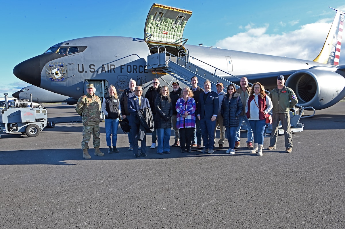 group photo in front of a KC135