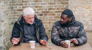 Two men on a bench outside - Outside 174_AR