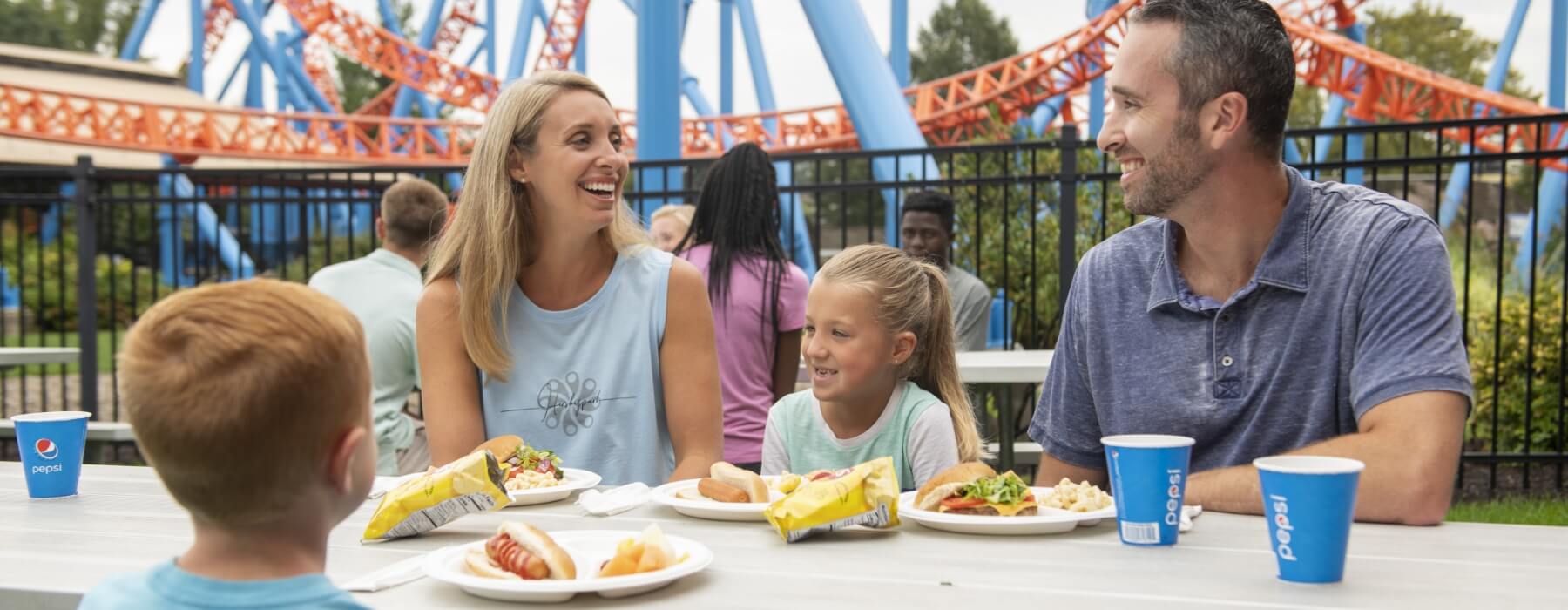 Family enjoying picnic at Fahrenheit Catering in Hersheypark