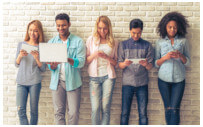 A group of students on their mobile devices.