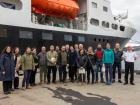 Visitors to the RRS James Cook on the quayside in front of the vessel during its stay in Nuuk, Greenland.