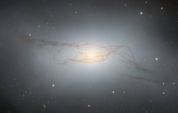 Gemini South Captures Twisted Dusty Disk of NGC 4753, Showcasing the Aftermath of Past Merger