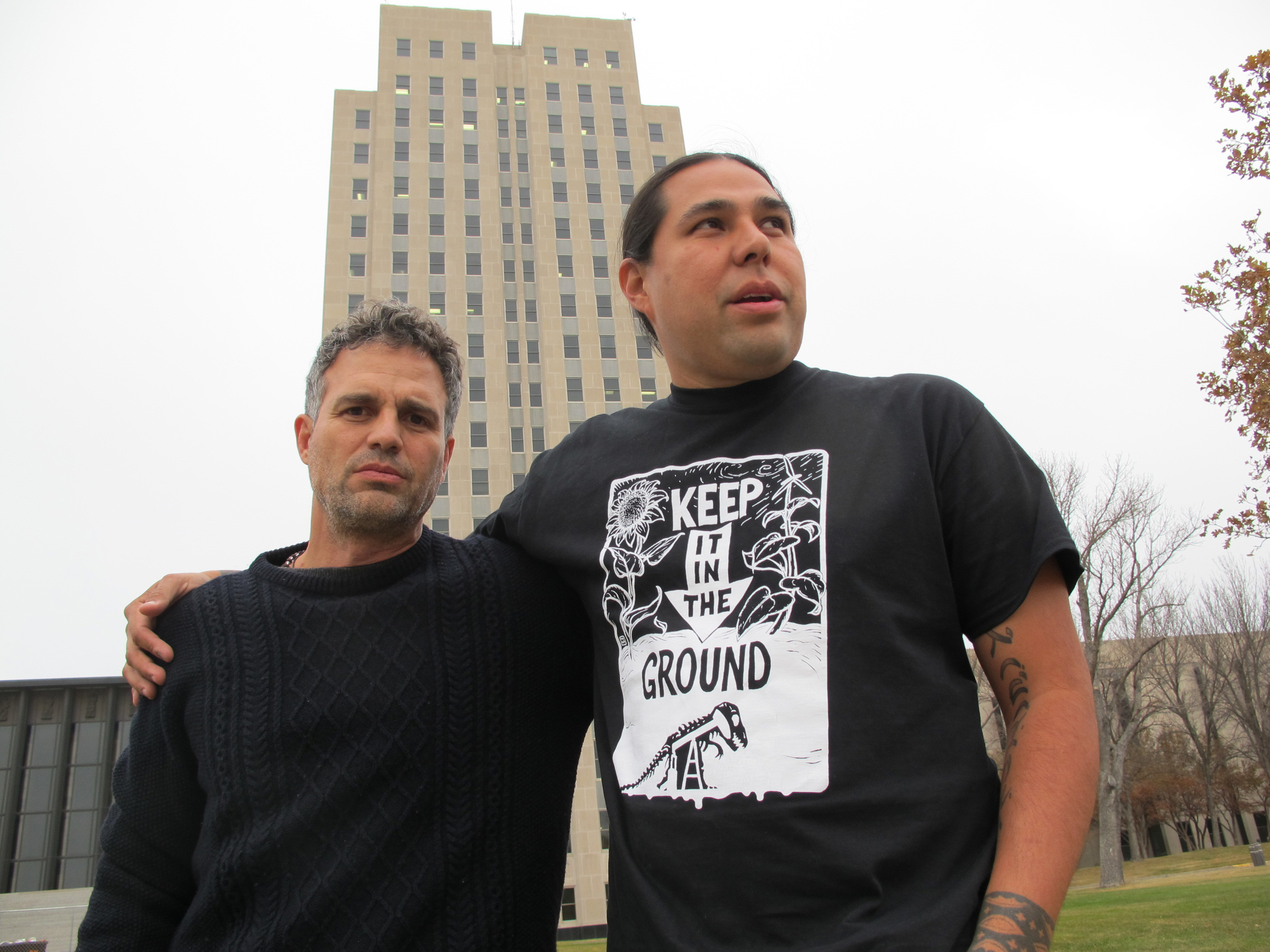 Actor-activist Mark Ruffalo, left, poses with Dallas Goldtooth, of the Indigenous Environmental Network