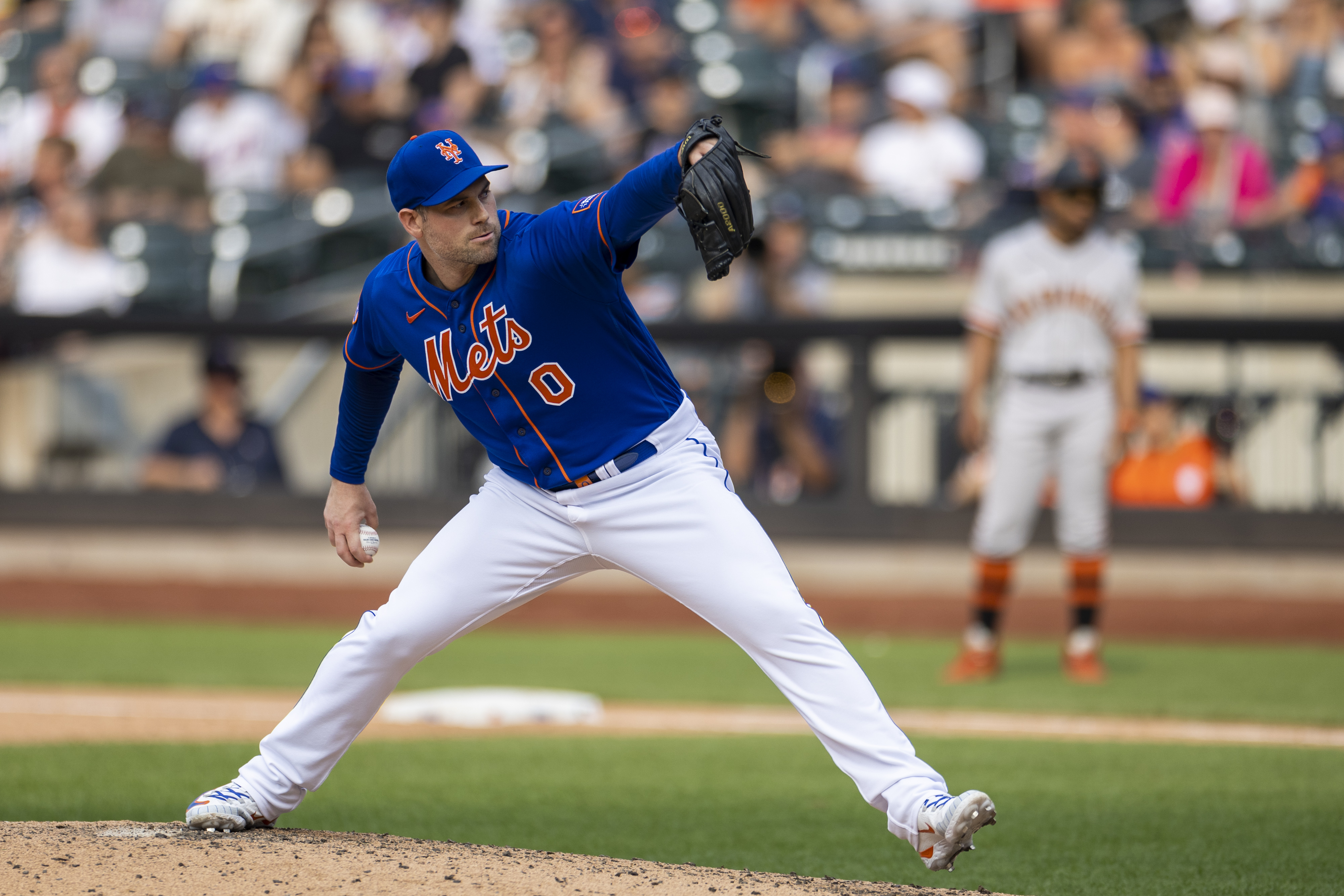 New York Mets relief pitcher Adam Ottavino throwing a ball during gameplay against the San Francisco Giants at Citi Field, Queens, NY.