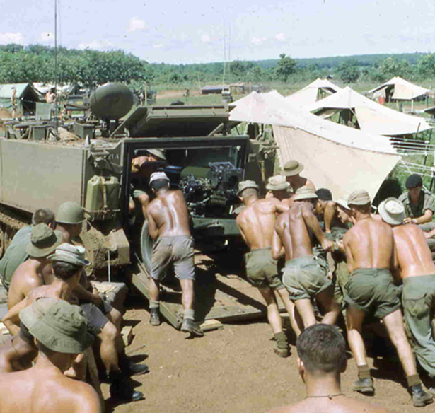 New Zealand gunners loading L5 Howitzer into APC