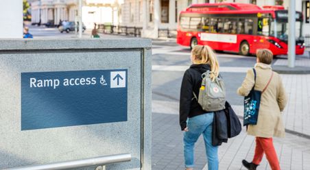 ramp access sign outside the college main entrance