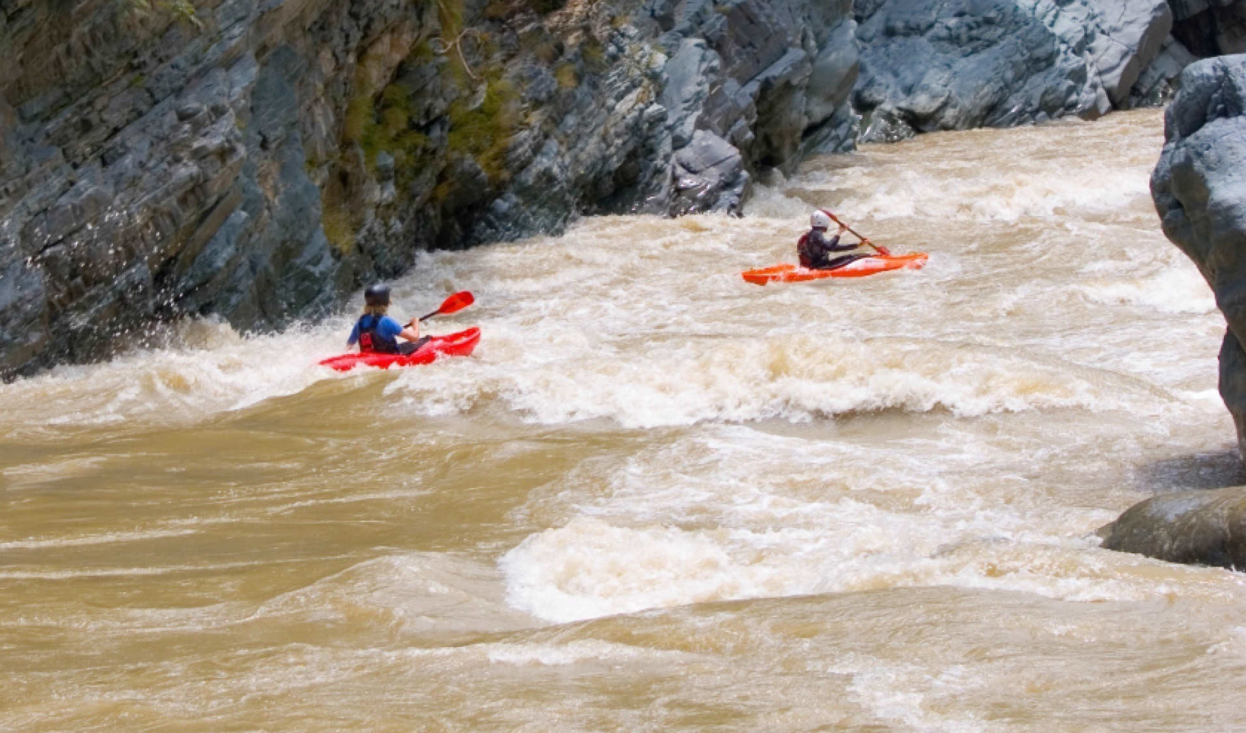 two students kayaking