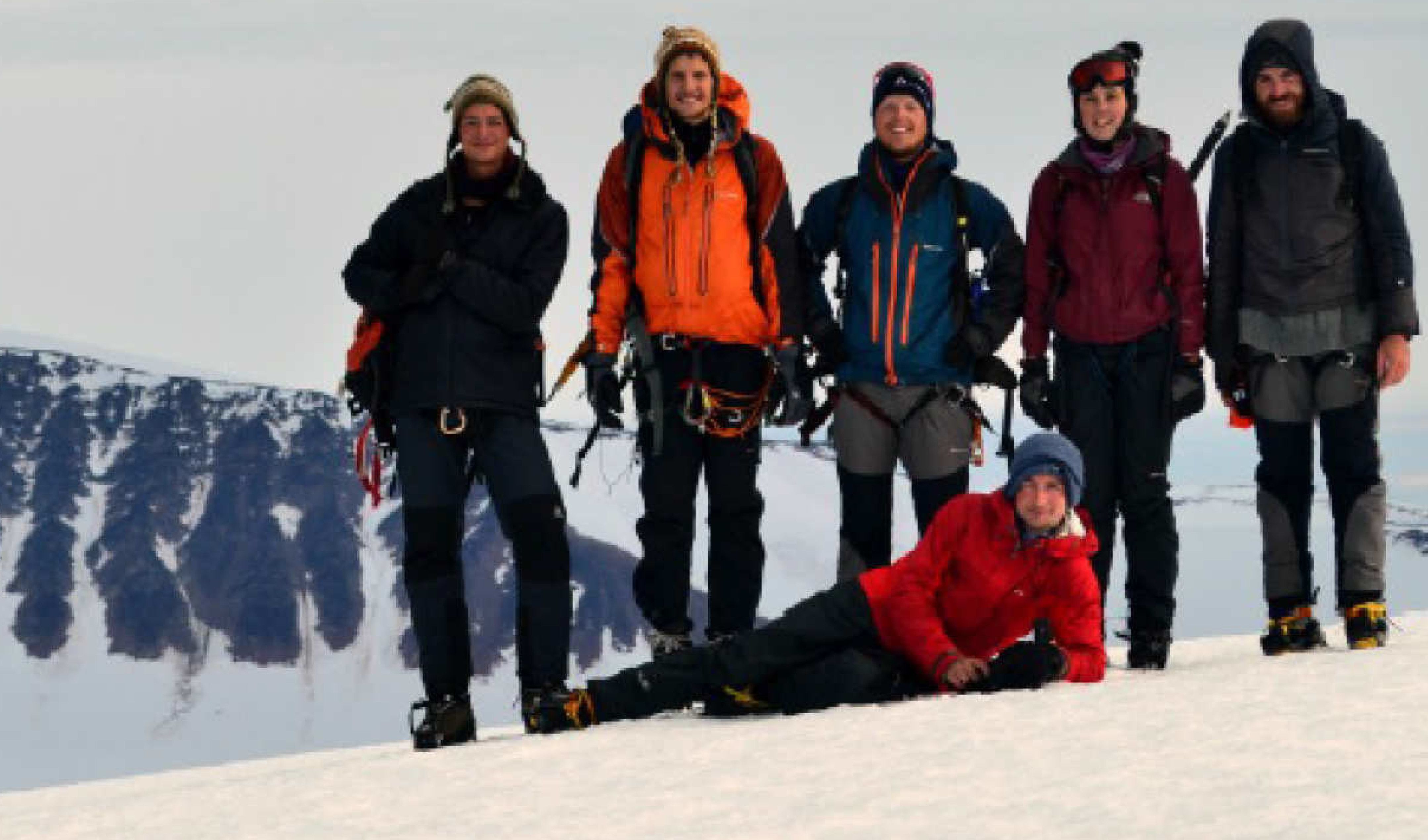 Group of six students on mountainside