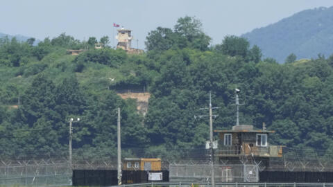 A North Korean military guard post, top, and South Korean post, bottom, are seen from Paju, South Korea, near the border with North Korea, Friday, May 31, 2024.