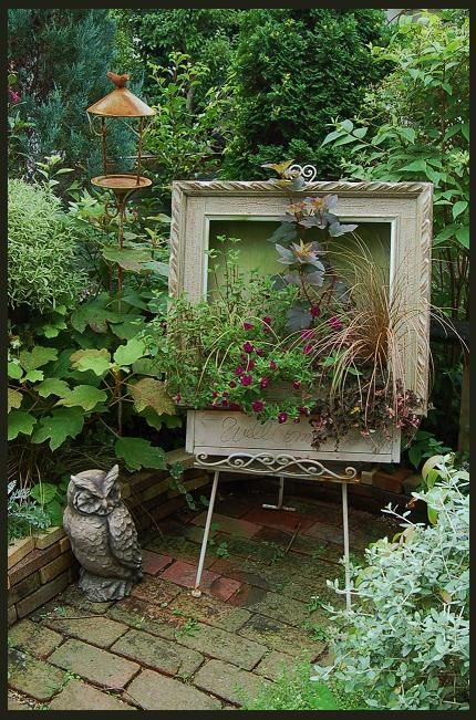 This picture planter box would also be so cute on a porch.  I think I would have to add one of my BIRD NESTS' in the corner.   LOVE THIS!: 