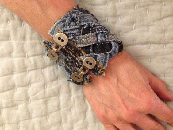 Don't toss those old Jeans out yet - salvage the seams, cut them into strips & weave them into a nazzy bracelet (sorry no instructions-just photo inspiration): 