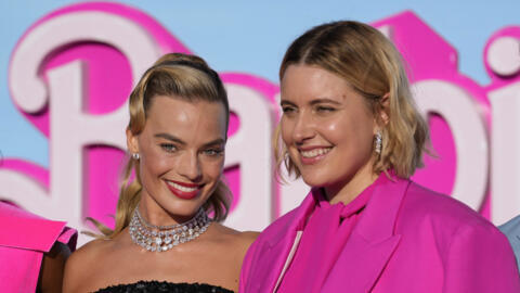 Margot Robbie, left, and writer/director/executive producer Greta Gerwig arrive at the premiere of "Barbie" on Sunday, July 9, 2023, at The Shrine Auditorium in Los Angeles.