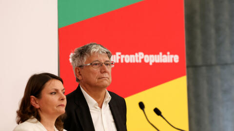 French left-wing party La France Insoumise (LFI) MP Eric Coquerel (R) and French Europe Ecologie - Les Verts (EELV) green party MP Eva Sas (R) attend a press conference to announce the cost and financ