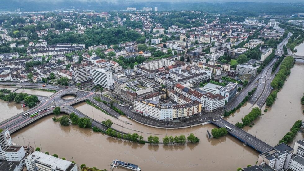 An aerial view taken on May 18, 2024 in Saarbruecken, western Germany shows the city motorway A620 partially inundated after heavy rains caused flooding.