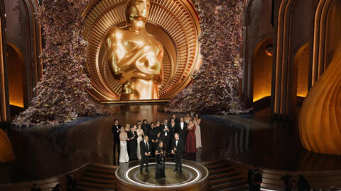 The cast and crew of "Oppenheimer" accept the award for best picture during the Oscars on Sunday, March 10, 2024, at the Dolby Theatre in Los Angeles.  