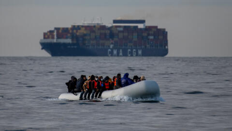 An inflatable dinghy carrying migrants heads towards England via the English Channel, UK on May 4, 2024.