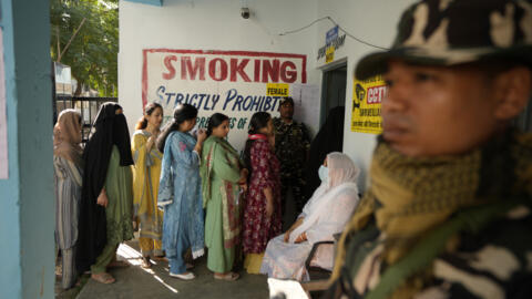 Paramilitary soldiers secure a polling station in Kishtwar in Jammu and Kashmir, India, September 18, 2024.