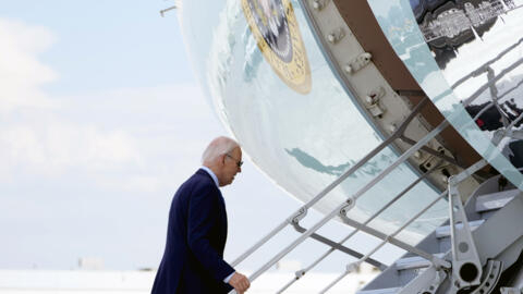 US President Joe Biden climbs the steps of Air Force One in Las Vegas, Nevada, on July 17, 2024.