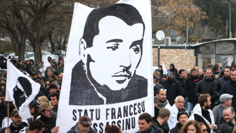 Protesters rally in the town of Corte,  a bastion of Corsican nationalism, following a violent attack on jailed pro-independence activist Yvan Colonna.