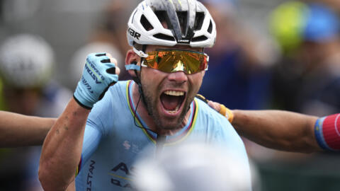 Britain's sprinter Mark Cavendish he crosses the finish line to win a record 35th Tour de France stage win, in Saint-Vulbas, France, July 3, 2024.