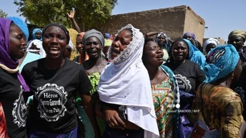 Mourners gather at a funeral for 18-year-old Synna Garandi in N'djamena on May 1, 2021, after his death during a demonstration in the Chadian capital.
