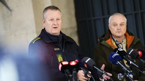 Chief police inspector and operational chief of intelligence service PET Flemming Drejer (R) and senior police inspector and head of emergency services in Copenhagen Police Peter Dahl hold a press bri