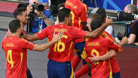 Spain celebrates after the team's first goal during the UEFA Euro 2024 quarter-final football match between Spain and Germany in Stuttgart on July 5, 2024.