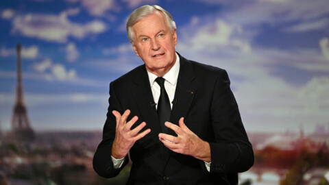 French Prime Minister Michel Barnier speaks during the evening news broadcast of French TV channel France 2 at the France Televisions studios in Paris, on September 22, 2024. 