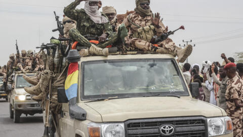 Chadian soldiers celebrate as they parade in N’Djamena on May 9, 2021. 