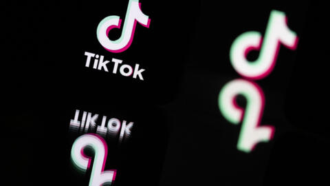 This photograph shows the logo of the social media video sharing app TikTok reflected in mirrors.