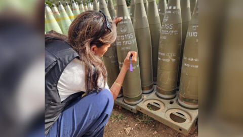 Former US presidential hopeful Nikki Haley photographed writing "Finish Them" on an Israeli shell as she toured sites near the northern border with Lebanon. The photograph was posted on X on May 28 by