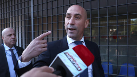Spain's former football chief Luis Rubiales talks to media as he arrives to testify over an alleged graft scandal at the court in Madrid on April 29, 2024. 