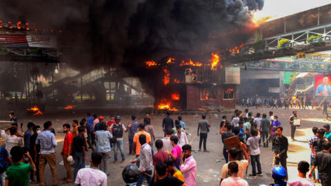 Anti-quota protesters clash with the police in Dhaka on July 18, 2024,  the deadliest day of ongoing student protests so far, which saw government buildings torched by demonstrators and a nationwide i