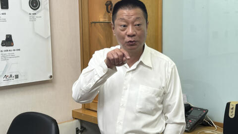 Hsu Ching-kuang, chairman of Apollo Gold, talks about the company's communication products in New Taipei City, Taiwan on September 18, 2024.