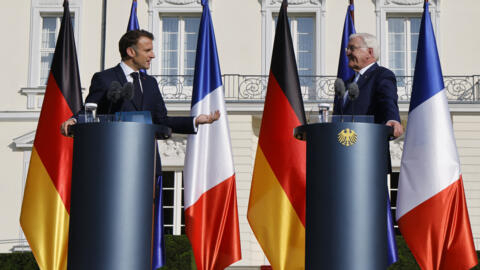 French President Emmanuel Macron (L) and German President Frank-Walter Steinmeier address a joint press conference after talks at Bellevue presidential palace in Berlin, Germany on May 26, 2024. 
