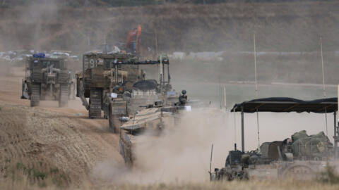 مركبات عسكرية إسرائيلية بالقرب من الحدود مع قطاع غزة في 12 مايو/ آذار