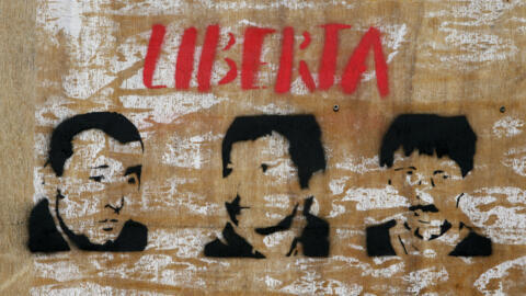 Graffiti calling for the release of Corsican nationalists Yvan Colonna, Alain Ferrandi and Pierre Alessandri, pictured in Bastia on March 14, 2022.