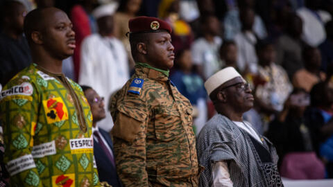 Burkina Faso military leader Captain Ibrahim Traore (C) attends the closing ceremony of the 28th Pan-African Film and Television Festival (FESPACO) in Ouagadougou, Burkina Faso on March 4, 2023. 
