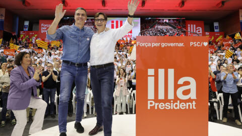 Spanish Prime Minister Pedro Sanchez, left, and Catalan Socialist Party candidate Salvador Illa during a rally on May 10, 2024, in Barcelona ahead of the regional elections in Catalonia