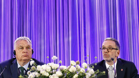 Hungary's Prime Minister Viktor Orban (L) attends a meeting with Chairman of Austria's right-wing Freedom Party Herbert Kickl for a joint statement, in Wien, on June 30, 2024.