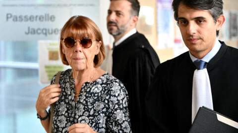 Gisele Pelicot and her lawyer Stephane Babonneau leave the Avignon courthouse in South France on September 17, 2024.