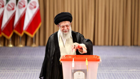 Iran's supreme leader Ayatollah Ali Khamenei casts his ballot during the presidential runoff elections in Tehran on July 5, 2024.