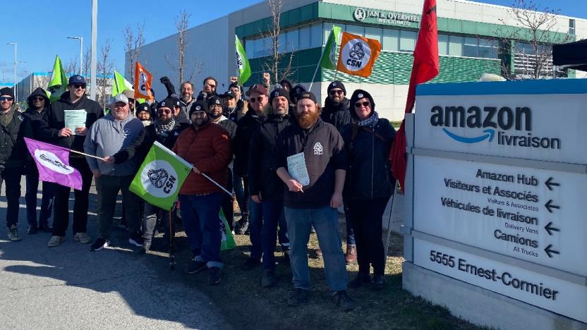 Amazon workers celebrate outside a warehouse in Laval, Quebec after forming a union.