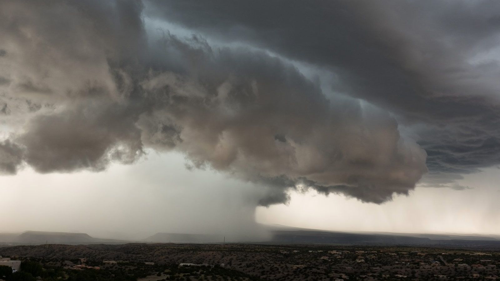 clouds over land to show climate change