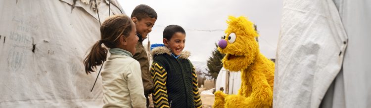 Basma talking to children.