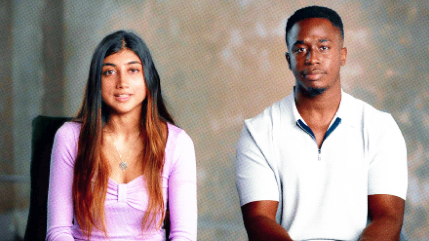 A man and a woman next to each other, photographed from the chest up