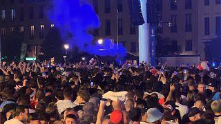 Hinchas de fútbol celebrando en Berlín